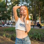 Model posing in sunny Mexico City park at golden hour, highlighting natural beauty and fashion.